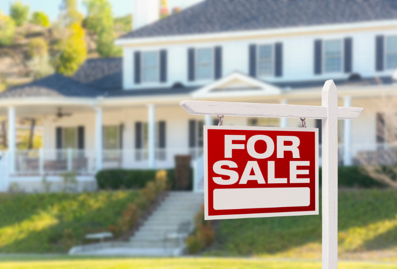 Home For Sale Sign in Front of New House