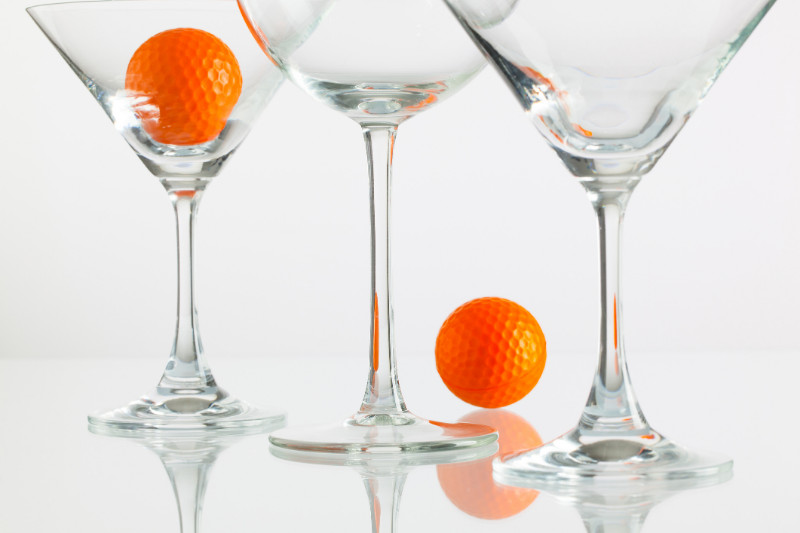 Golf balls and champagne glasses